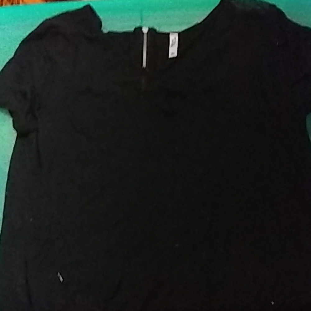 A top with a mesh line